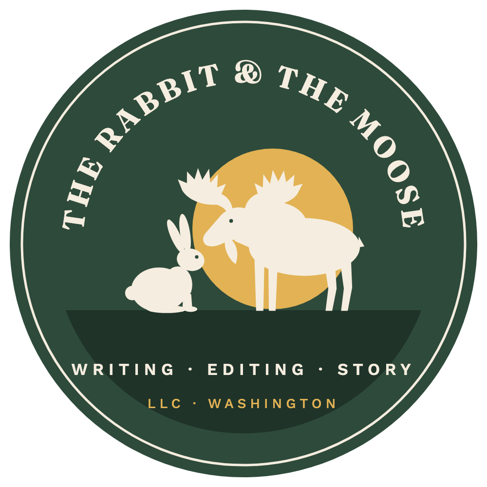 The Rabbit and the Moose logo: a rabbit and a moose touching noses in front of a golden moon