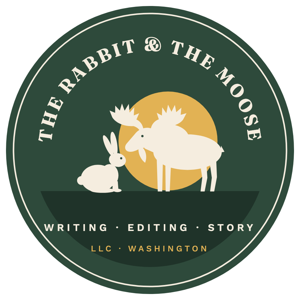 The Rabbit and the Moose logo: a rabbit and a moose touching noses in front of a golden moon